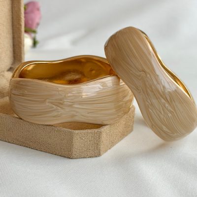 دستبند دفرمه کرم
