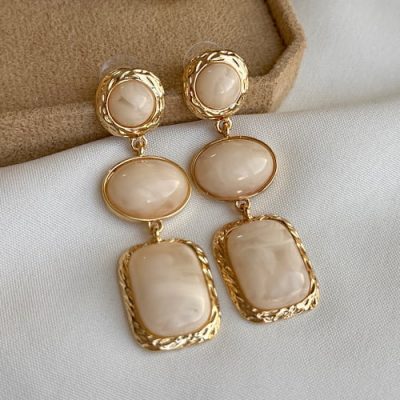 گوشواره آویز کرم لندی
